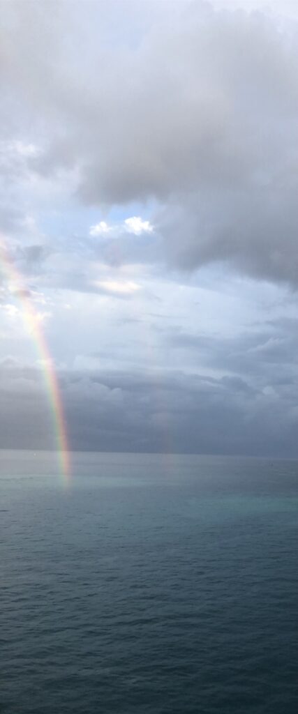 Double Rainbow over a body of water